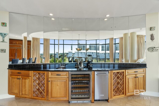 bar featuring light tile patterned floors, beverage cooler, indoor wet bar, and recessed lighting