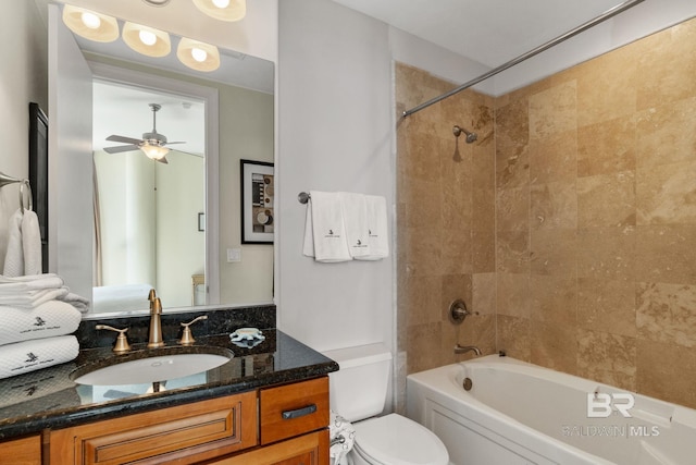 full bathroom with shower / washtub combination, vanity, toilet, and a ceiling fan