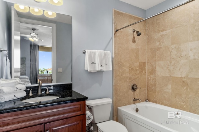 full bath featuring washtub / shower combination, ceiling fan, vanity, and toilet