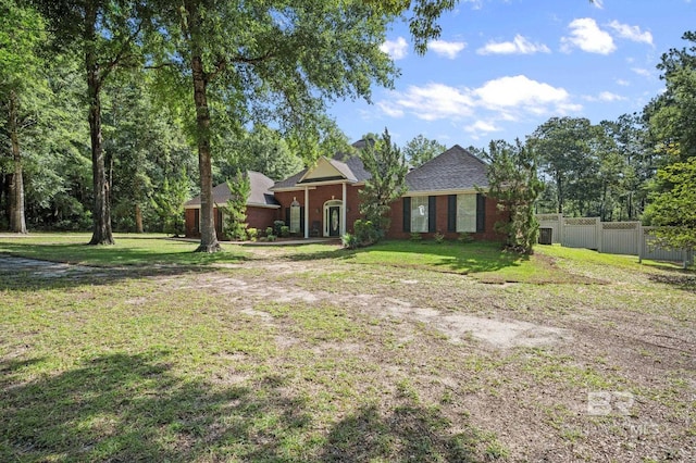 ranch-style house with a front yard