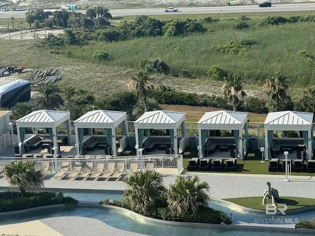 exterior space featuring boat lift and a gazebo