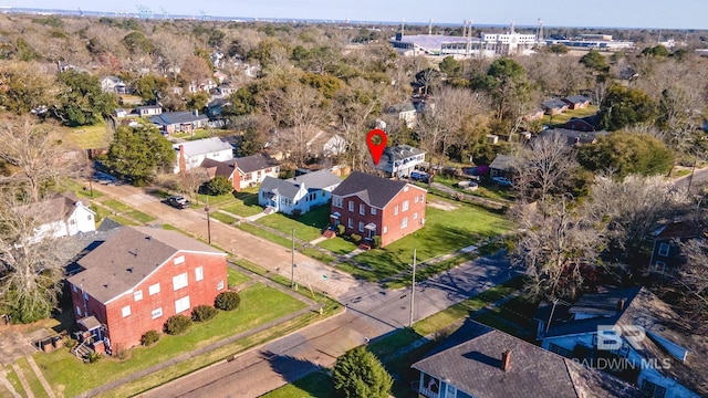 birds eye view of property with a residential view