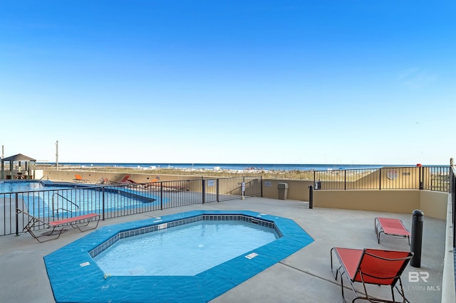 24230 Perdido Beach Blvd Unit 3077, Orange Beach, AL 36561 - view of swimming pool with a water view, a beach view, and a patio area