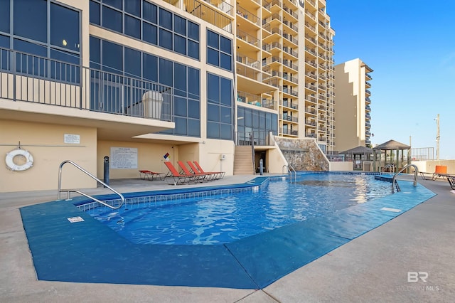 24230 Perdido Beach Blvd Unit 3077, Orange Beach, AL 36561 - pool featuring a patio