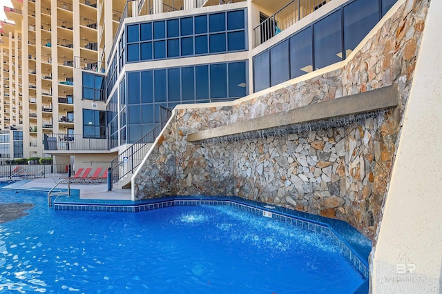 24230 Perdido Beach Blvd Unit 3077, Orange Beach, AL 36561 - community pool featuring stairs and a patio