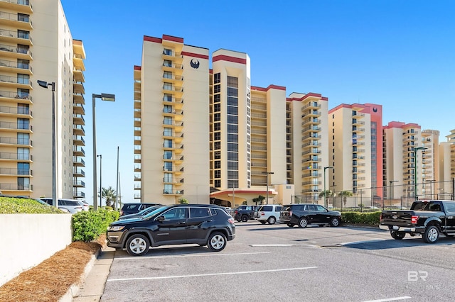 24230 Perdido Beach Blvd Unit 3077, Orange Beach, AL 36561 - view of building exterior with uncovered parking