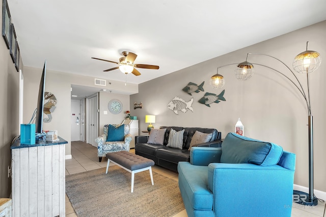 24230 Perdido Beach Blvd Unit 3077, Orange Beach, AL 36561 - living area featuring light tile patterned floors, visible vents, and ceiling fan