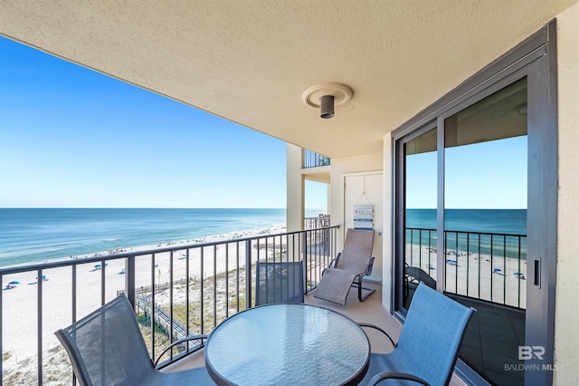 24230 Perdido Beach Blvd Unit 3077, Orange Beach, AL 36561 - balcony featuring a beach view, outdoor dining area, and a water view