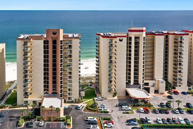 24230 Perdido Beach Blvd Unit 3077, Orange Beach, AL 36561 - view of building exterior featuring uncovered parking and a water view