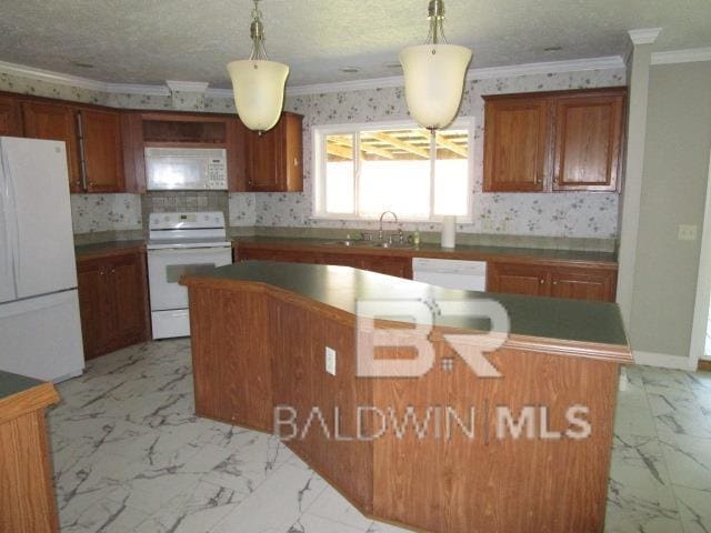 kitchen with hanging light fixtures, white appliances, marble finish floor, and a center island