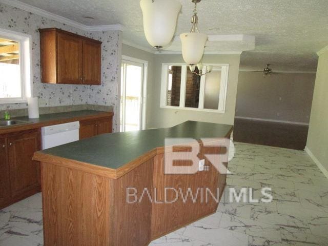 kitchen featuring brown cabinetry, dishwasher, dark countertops, a kitchen island, and marble finish floor