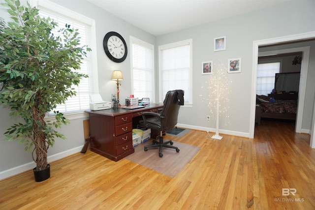 office area featuring light hardwood / wood-style flooring