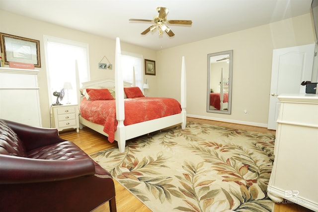 bedroom featuring ceiling fan and light hardwood / wood-style floors