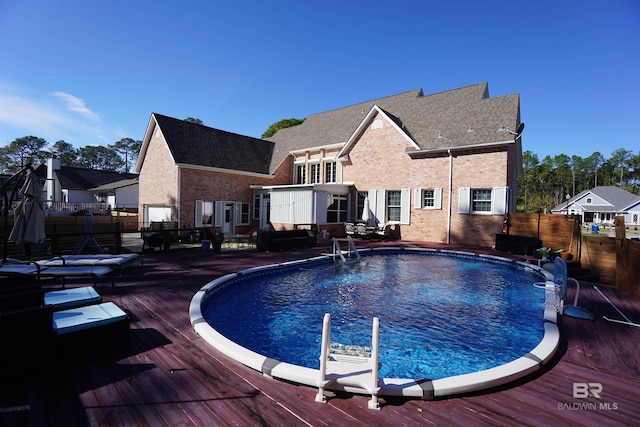 view of pool featuring a deck