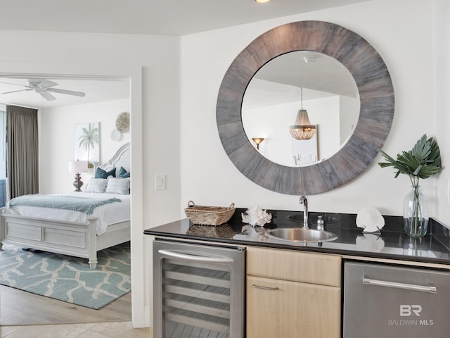 28105 Perdido Beach Blvd Unit C504, Orange Beach, AL 36561 - bar with ceiling fan, wine cooler, dishwasher, a sink, and indoor wet bar