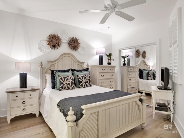 28105 Perdido Beach Blvd Unit C504, Orange Beach, AL 36561 - bedroom with light wood-style floors, baseboards, and ceiling fan