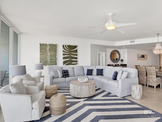 28105 Perdido Beach Blvd Unit C504, Orange Beach, AL 36561 - living room featuring visible vents, tile patterned flooring, and ceiling fan