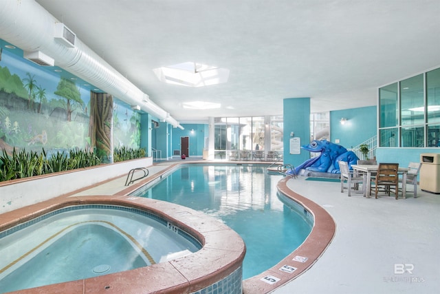 28105 Perdido Beach Blvd Unit C504, Orange Beach, AL 36561 - community pool featuring an indoor hot tub and a skylight