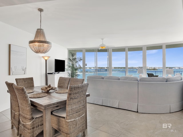28105 Perdido Beach Blvd Unit C504, Orange Beach, AL 36561 - dining room with ceiling fan, light tile patterned floors, and floor to ceiling windows