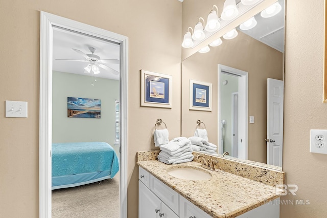 bathroom featuring vanity and ceiling fan