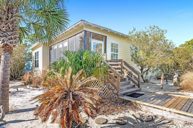 view of front of house with a deck