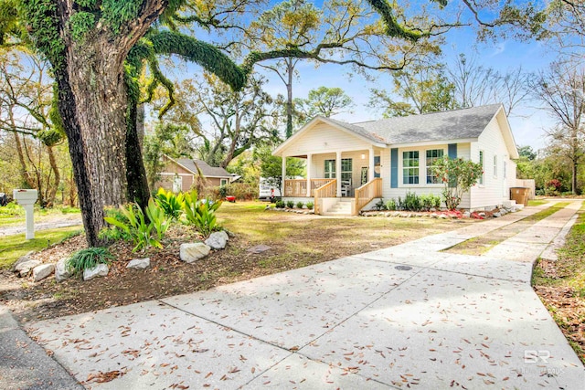 view of front of property featuring covered porch