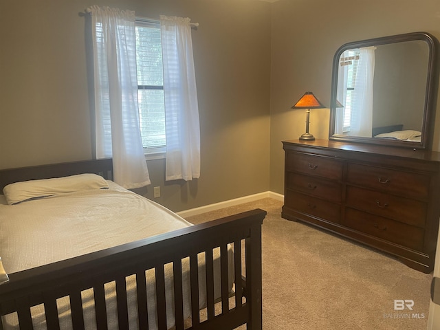 2274 Foshee Rd, Brewton, AL 36426 - bedroom featuring light carpet and baseboards