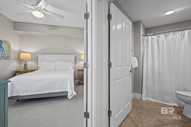 521 W Beach Blvd Unit 1702, Gulf Shores, AL 36542 - bedroom with tile patterned flooring and a ceiling fan