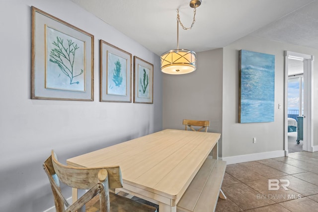 521 W Beach Blvd Unit 1702, Gulf Shores, AL 36542 - tiled dining area with baseboards