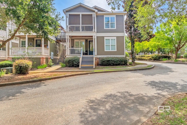25806 Pollard Rd Unit 204, Daphne, AL 36526 - townhome / multi-family property with stairs and covered porch