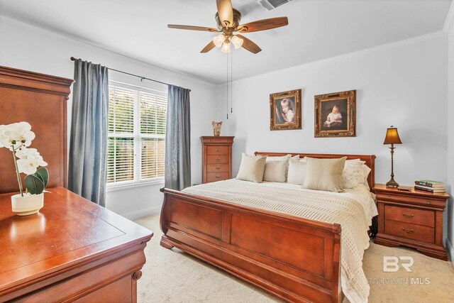 25806 Pollard Rd Unit 204, Daphne, AL 36526 - bedroom with light carpet and ceiling fan