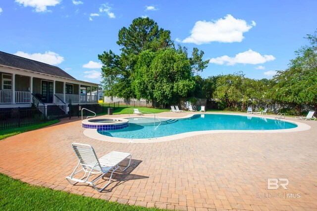 25806 Pollard Rd Unit 204, Daphne, AL 36526 - view of pool with a patio and a pool with connected hot tub