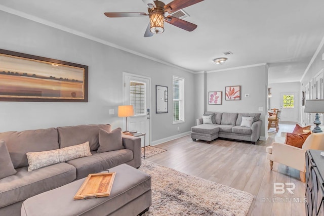 25806 Pollard Rd Unit 204, Daphne, AL 36526 - living area featuring light wood finished floors, a ceiling fan, and crown molding