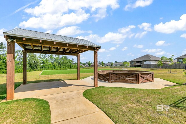 view of yard with a gazebo, a patio, and fence