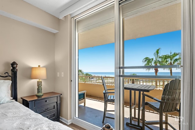 527 Beach Club Trl Unit C305, Gulf Shores, AL 36542 - bedroom featuring baseboards, access to exterior, and a water view