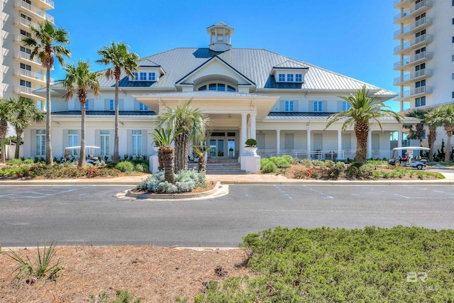 527 Beach Club Trl Unit C305, Gulf Shores, AL 36542 - view of building exterior with uncovered parking