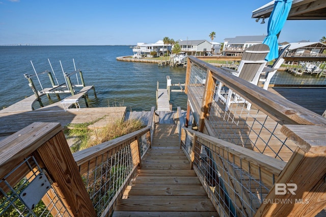 316 Quivira St, Dauphin Island, AL 36528 - view of dock with a water view and boat lift