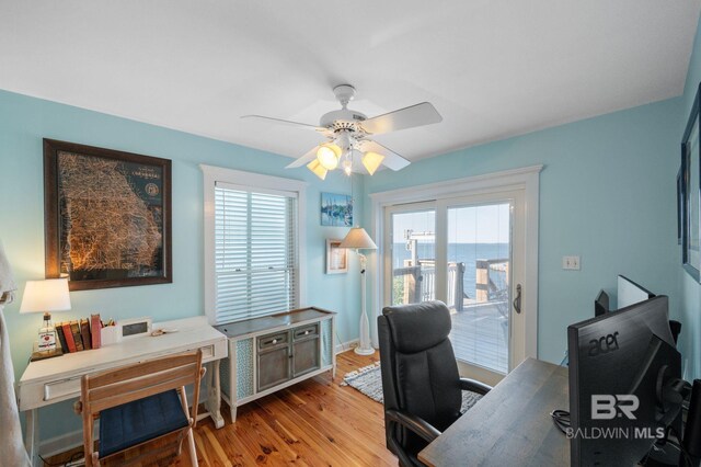 316 Quivira St, Dauphin Island, AL 36528 - office area featuring light wood-type flooring and a ceiling fan