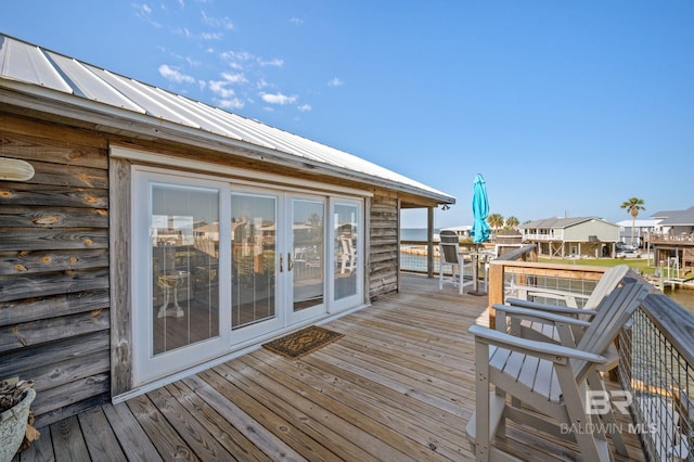 316 Quivira St, Dauphin Island, AL 36528 - wooden deck featuring french doors