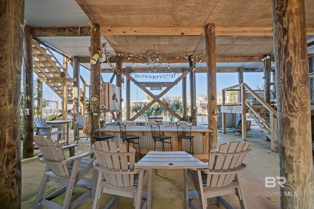 316 Quivira St, Dauphin Island, AL 36528 - view of patio with stairway and outdoor dry bar