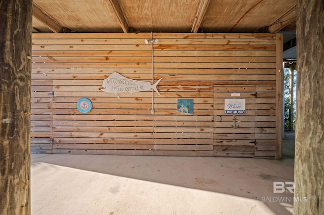 316 Quivira St, Dauphin Island, AL 36528 - interior space featuring wooden ceiling and wooden walls