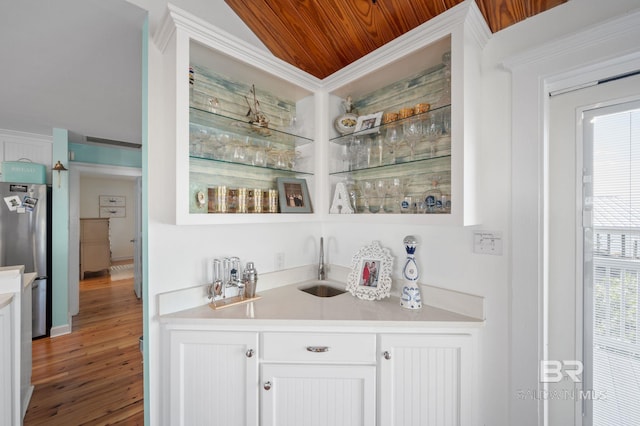 316 Quivira St, Dauphin Island, AL 36528 - bar with wooden ceiling, indoor wet bar, a sink, freestanding refrigerator, and wood finished floors