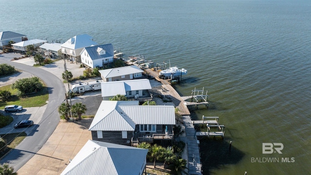 316 Quivira St, Dauphin Island, AL 36528 - drone / aerial view featuring a water view