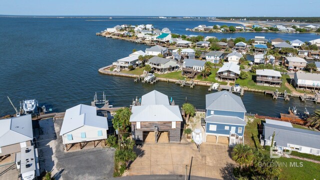 316 Quivira St, Dauphin Island, AL 36528 - bird's eye view with a water view and a residential view