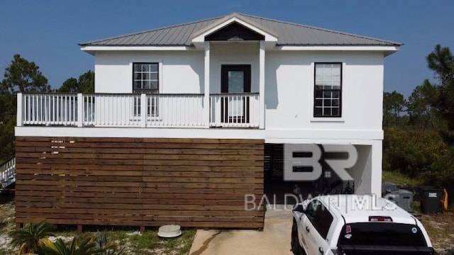 view of front of property with metal roof