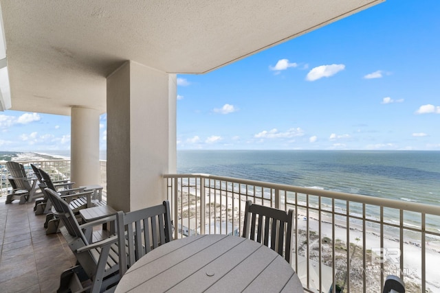 375 Beach Club Dr Unit 1801, Gulf Shores, AL 36542 - balcony with view of water and beach and outdoor dining space