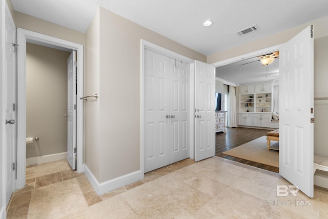 375 Beach Club Dr Unit 1801, Gulf Shores, AL 36542 - hall with baseboards, built in features, and recessed lighting