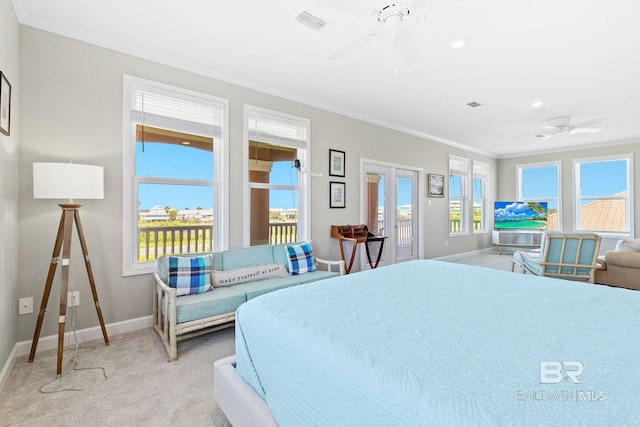 bedroom with ornamental molding, ceiling fan, french doors, and light colored carpet