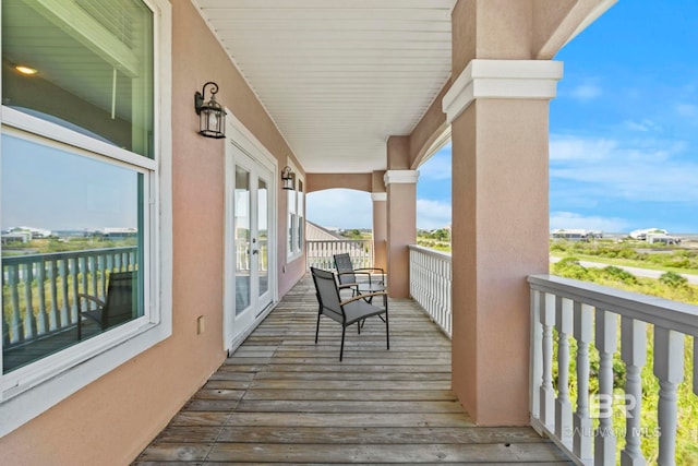 balcony featuring french doors