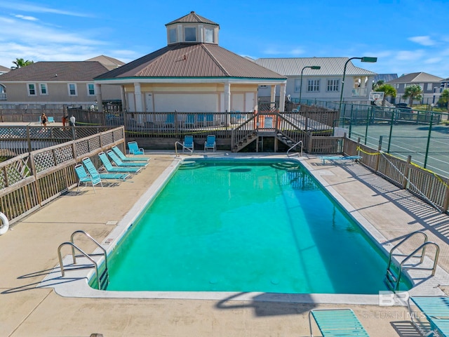 view of pool with a patio area
